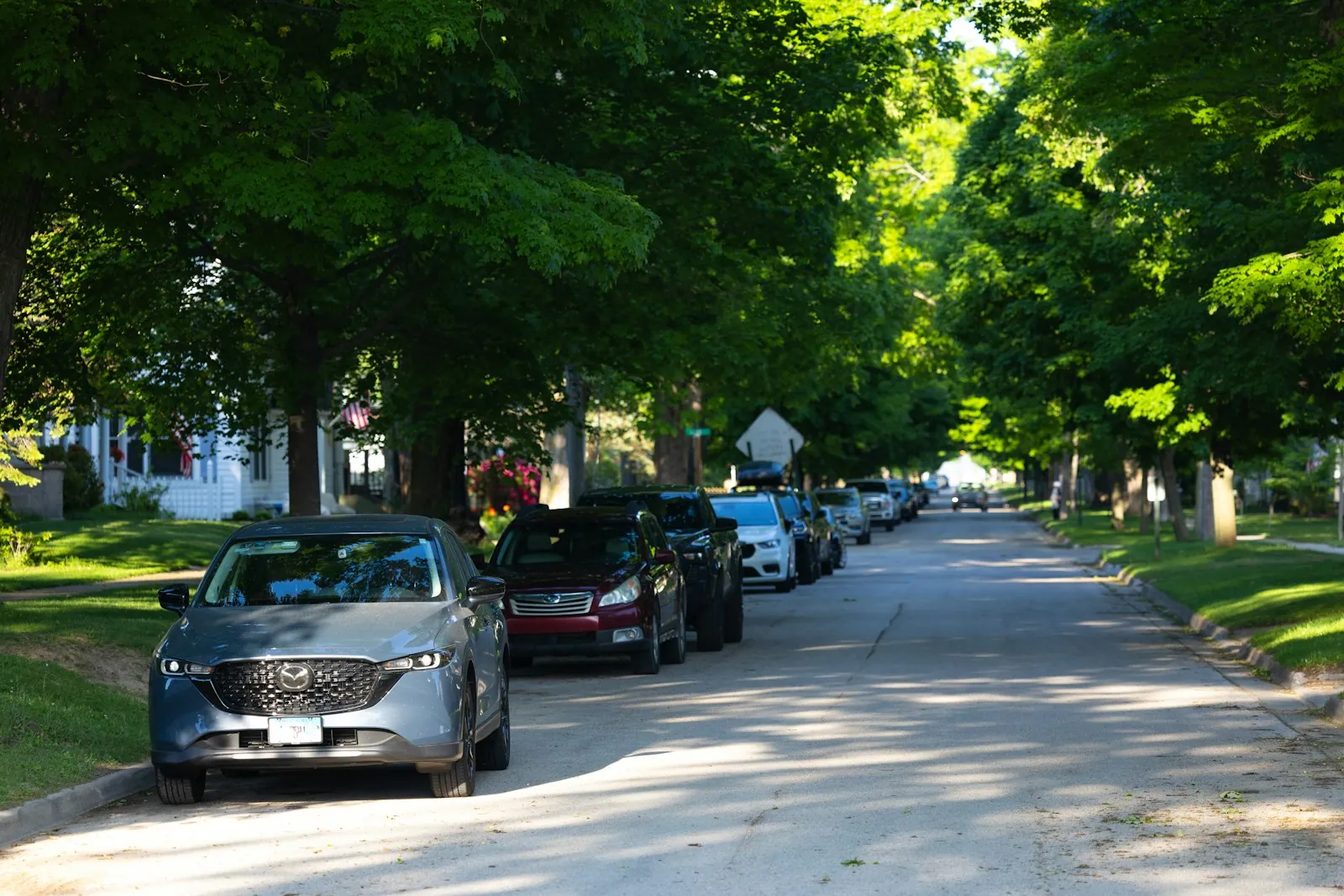 A student driver on a quiet residential street