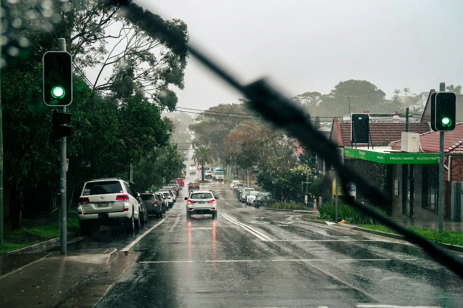 A wet suburban road in the rain, the kind teens practise on in Kent