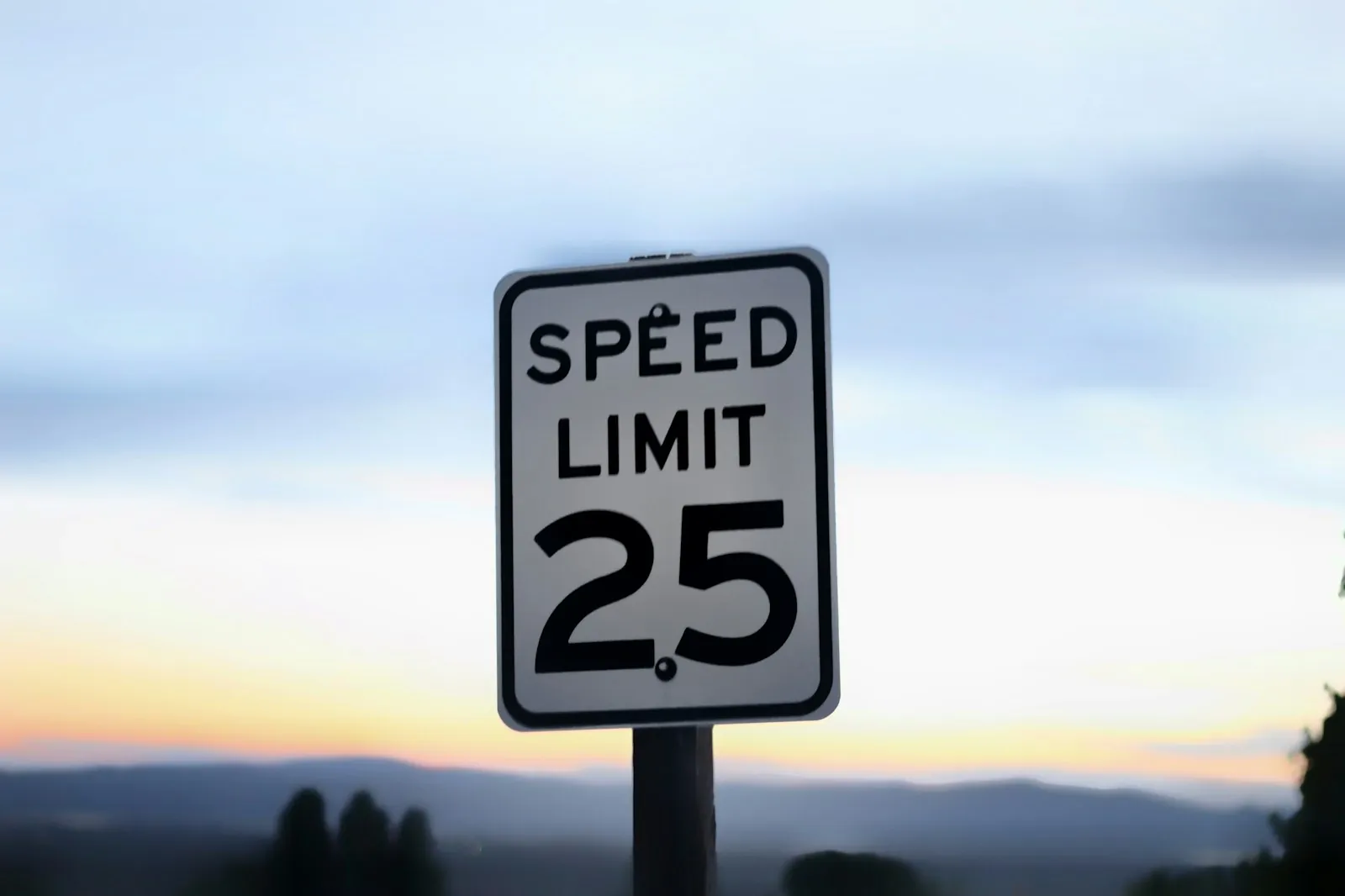 A school zone sign with a 20 mph speed limit
